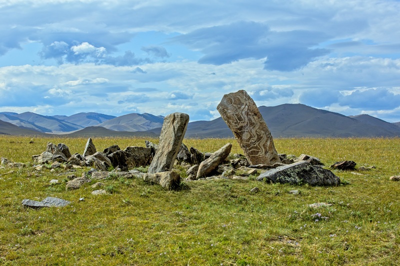 Nomadic family with livestock in forested landscape near Khovsgol Lake Mongolia